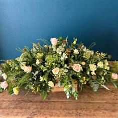 Soft peach casket spray