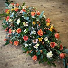 Autumnal shades casket spray