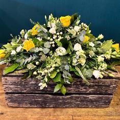 Glorious yellow casket spray